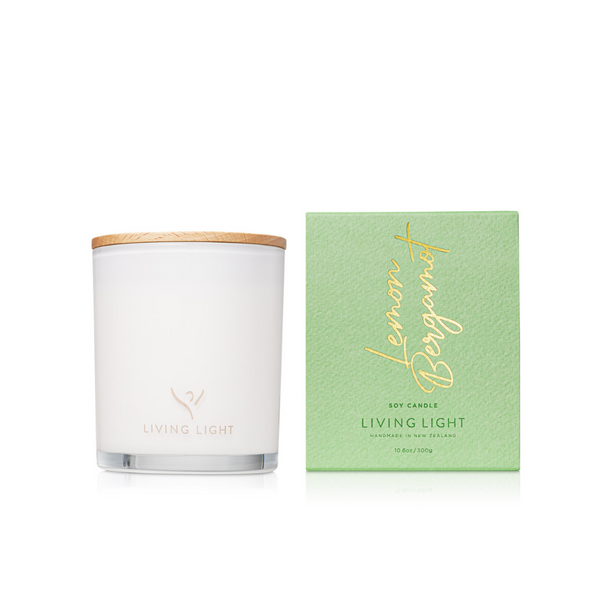 lemon bergamot living light soy candle, handmade in Nz. set in glass packaging- placed in a green box 