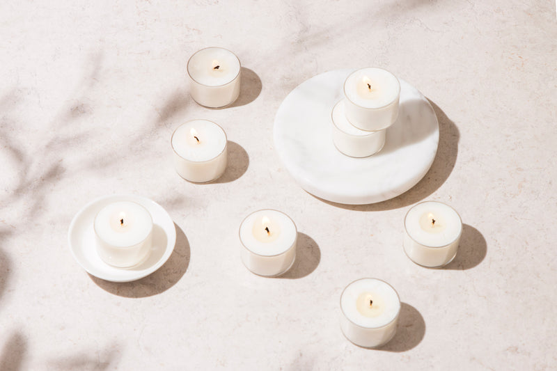 8 soy wax tea light lit on marble table