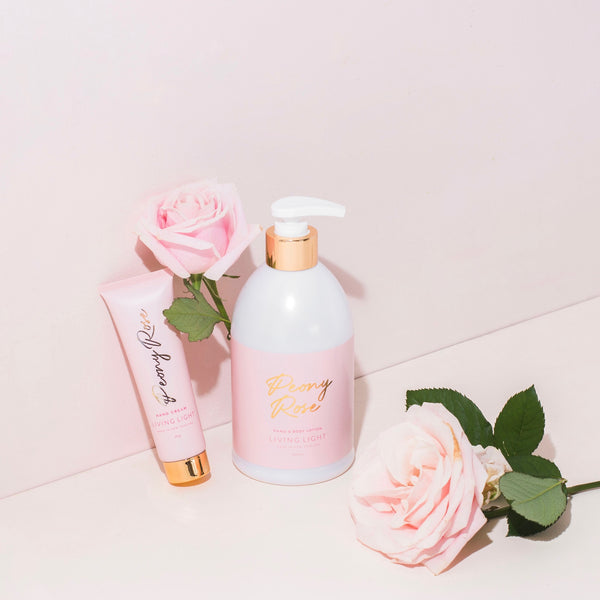 peony rose body lotion with pink background and baby pink roses  